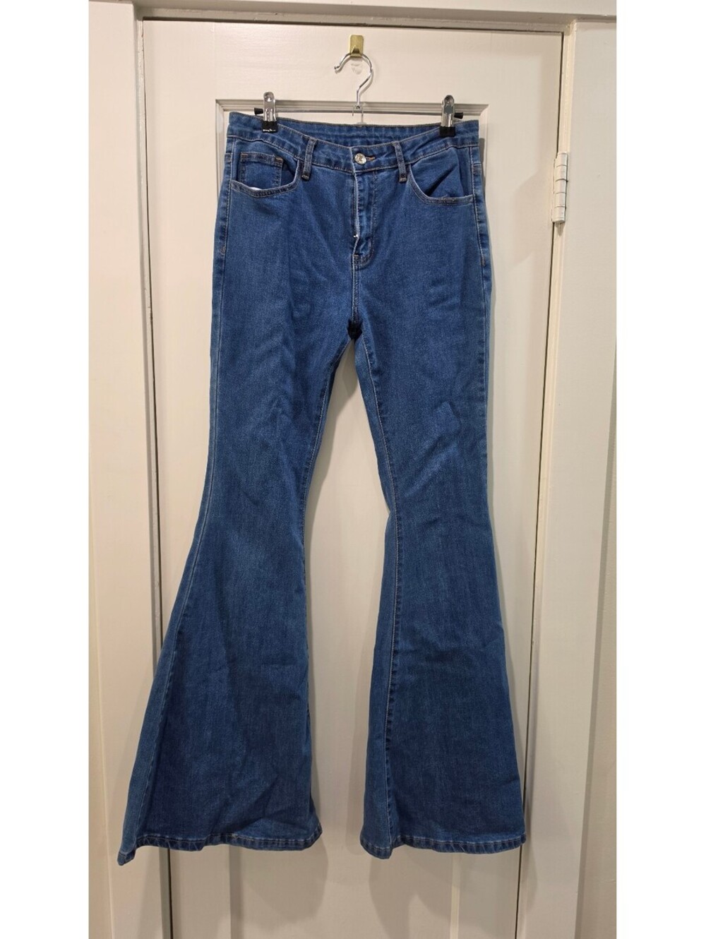 Blue Flared Jeans with Floral Embroidery on Back Pockets